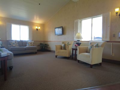 Cozy common area with seating and windows