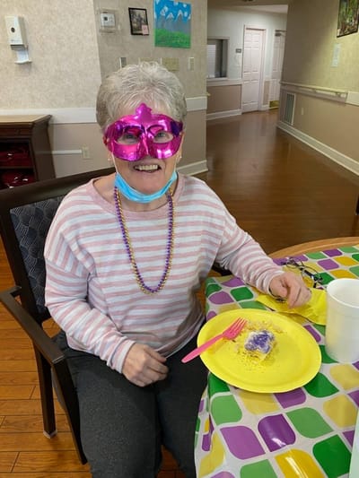 Resident enjoying a festive meal with decorations
