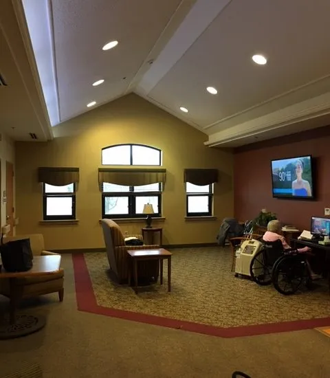 Interior view of a common area with residents