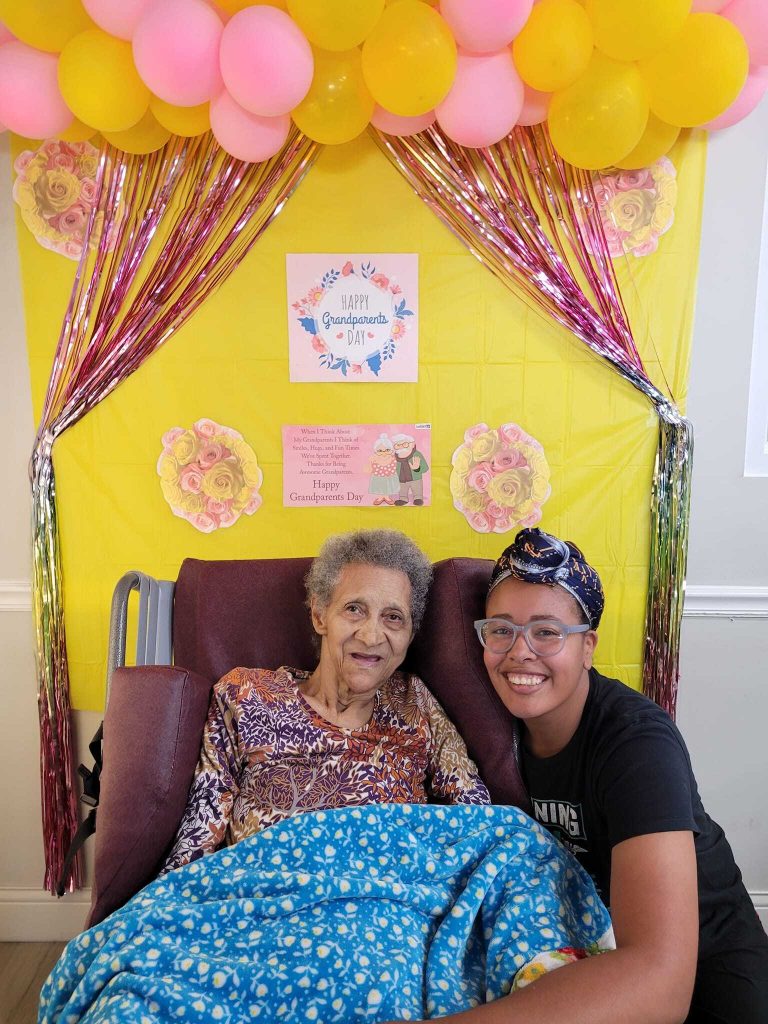 Resident celebrating Grandparents Day with a visitor