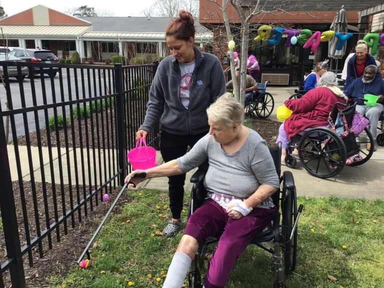 Residents and staff participating in an outdoor activity
