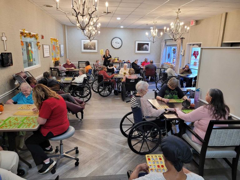 Residents playing bingo in a common area