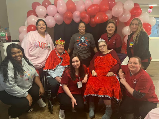 Residents and staff celebrating an event together