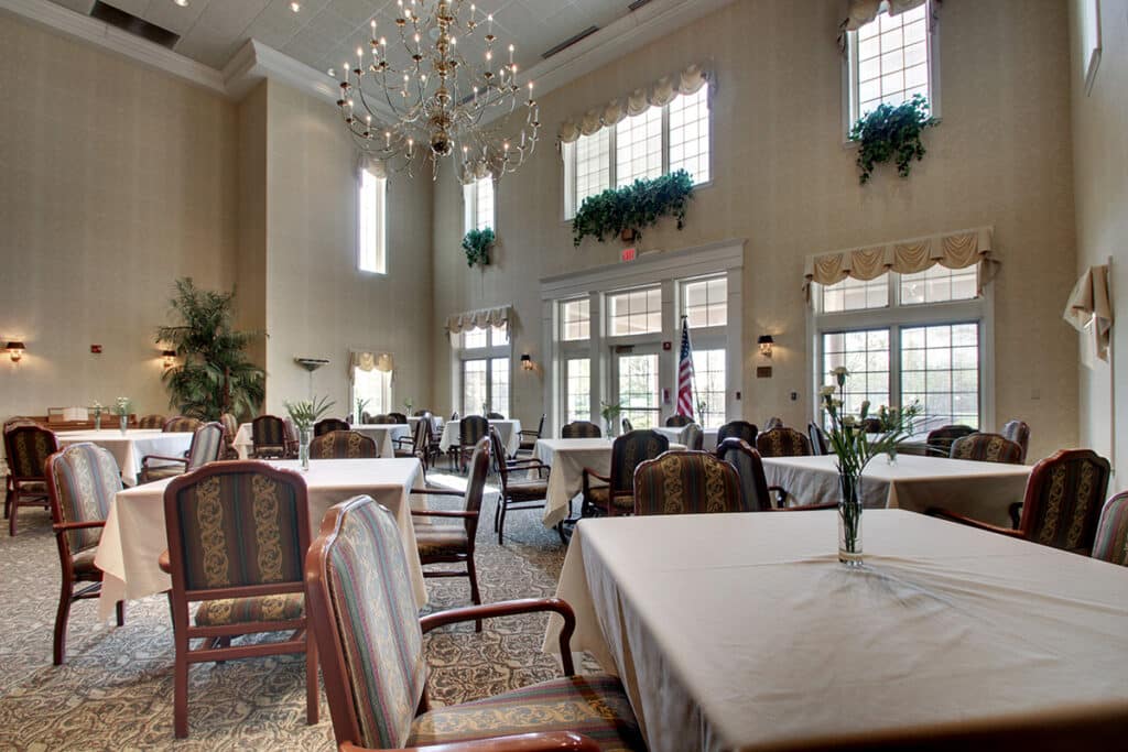 Interior dining room with set tables and chairs