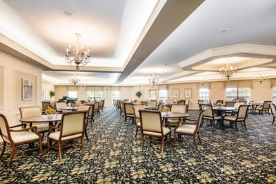 Bright dining room with tables and chairs