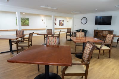 Bright interior seating area with tables and chairs