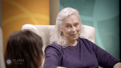 Resident engaged in conversation with staff