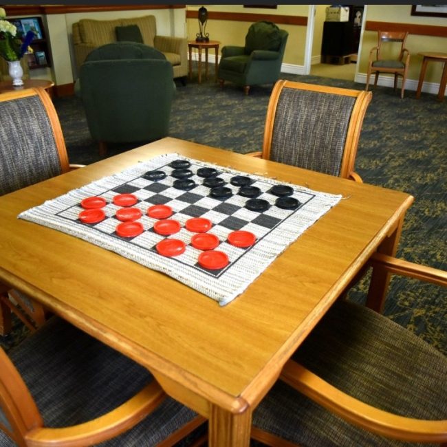 Checkers on a table in a common area
