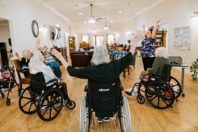 Residents participating in a group exercise activity
