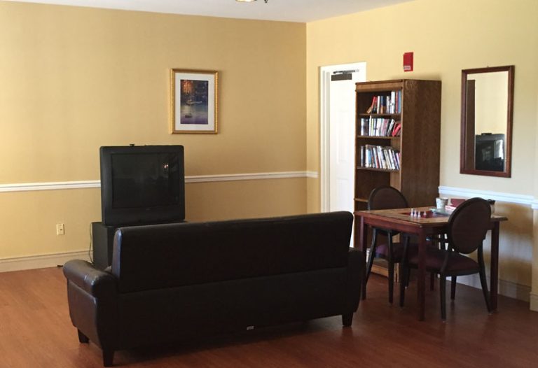 Interior view of a cozy common area with furniture