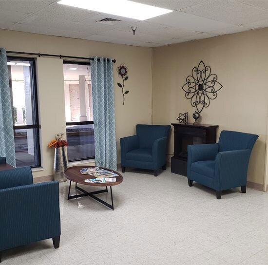 Interior lounge area with chairs and decor