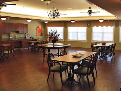 Bright common area with tables and chairs
