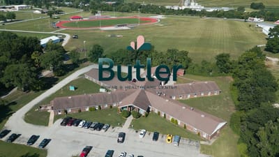 Aerial view of a senior living facility building and grounds