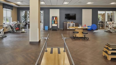 Interior view of a gym with exercise equipment