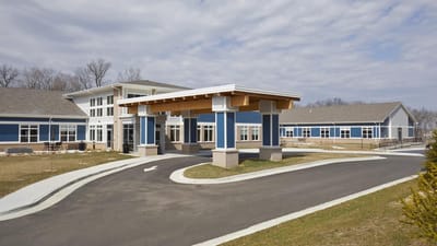 Exterior view of a senior living facility entrance