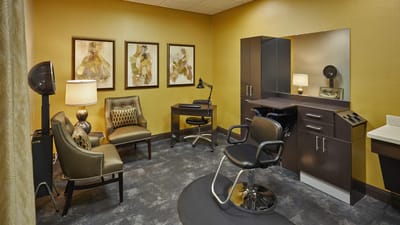 Interior view of a beauty salon area with seating