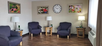 Cozy lounge area with chairs and decor
