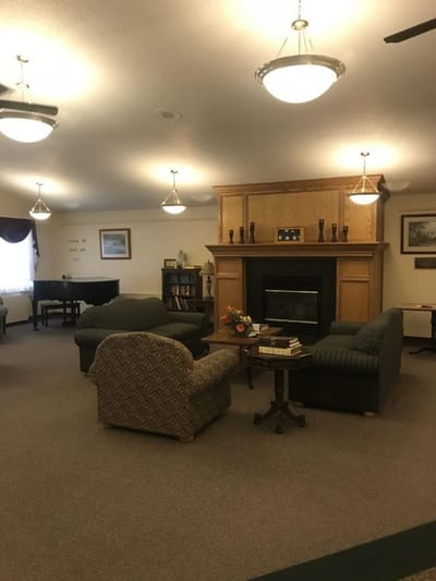 Cozy common area with seating and a fireplace