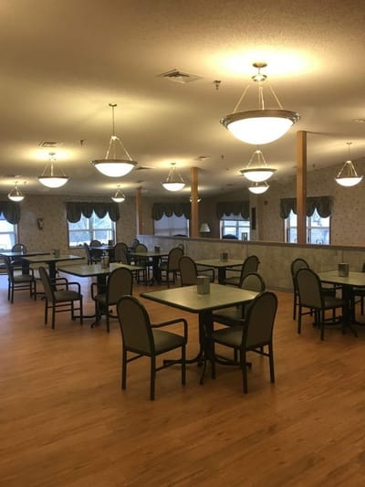 Bright dining room with tables and chairs