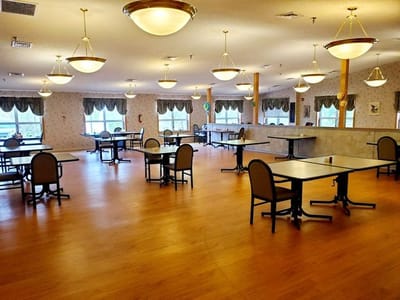 Bright dining room with tables and chairs