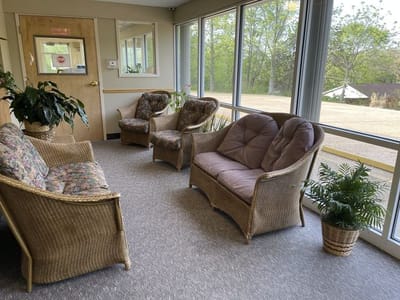 Cozy seating area with natural light and plants