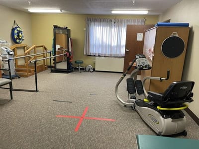 Rehabilitation therapy room with exercise equipment