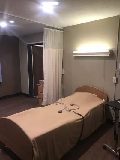 Private resident room with a bed and minimal decor