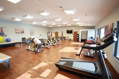 Interior view of an exercise room with equipment