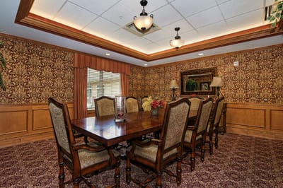 Elegant dining room with a large table and floral decor