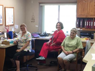 Staff and residents in a common area.