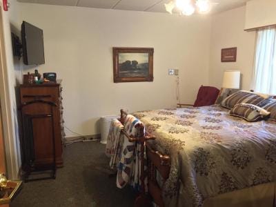 Cozy resident room with a bed and furniture