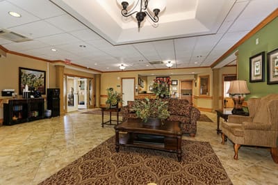 Interior lobby area with seating and decorations
