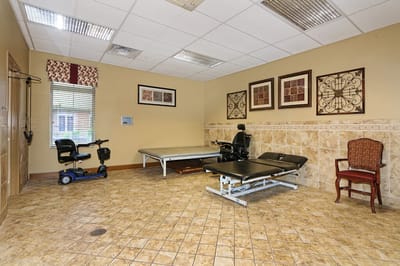Physical therapy room with exercise equipment