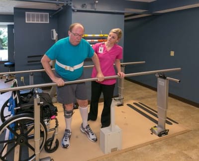Physical therapy session in a well-lit facility room