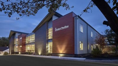 Exterior view of The Shubert Pavilion at dusk