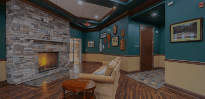 Cozy common area with a fireplace and seating