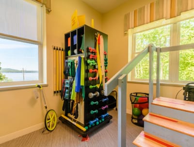 Well-equipped fitness area with weights and exercise gear