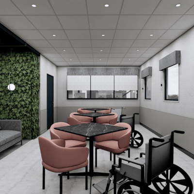 Bright common area with seating and wheelchairs