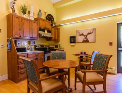 Cozy interior kitchen area with dining tables