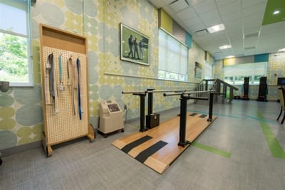 Physical therapy equipment in a bright interior space
