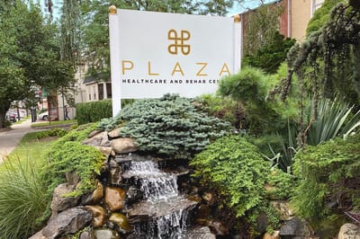 Signage for a healthcare and rehab center with landscaping