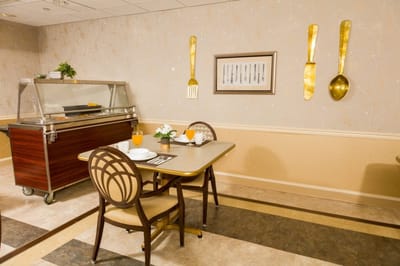 Dining area setup with breakfast items and decor