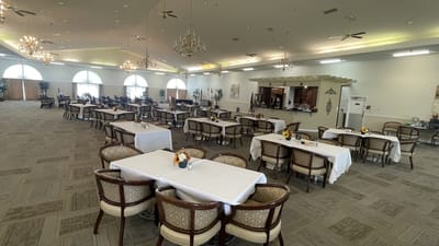 Spacious dining area with tables and chairs