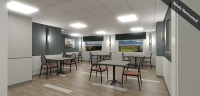Light-filled dining area with newly renovated tables and chairs
