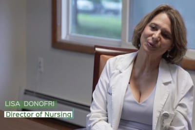 Director of nursing speaking in a well-lit office