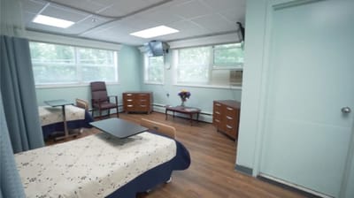 Interior view of a shared resident room with two beds