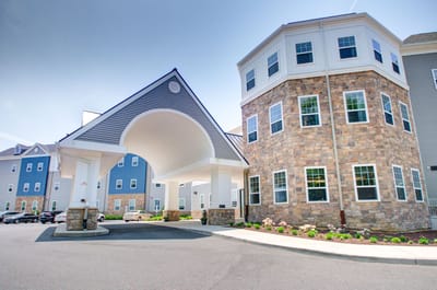 Entrance view of a modern assisted living facility