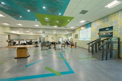 Bright interior space with staff and residents engaged