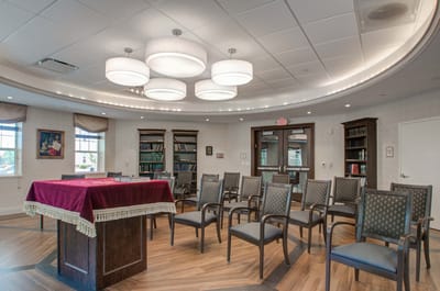 Interior meeting room with chairs and a table