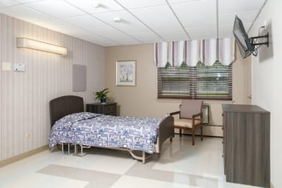 A private bedroom in a senior care facility